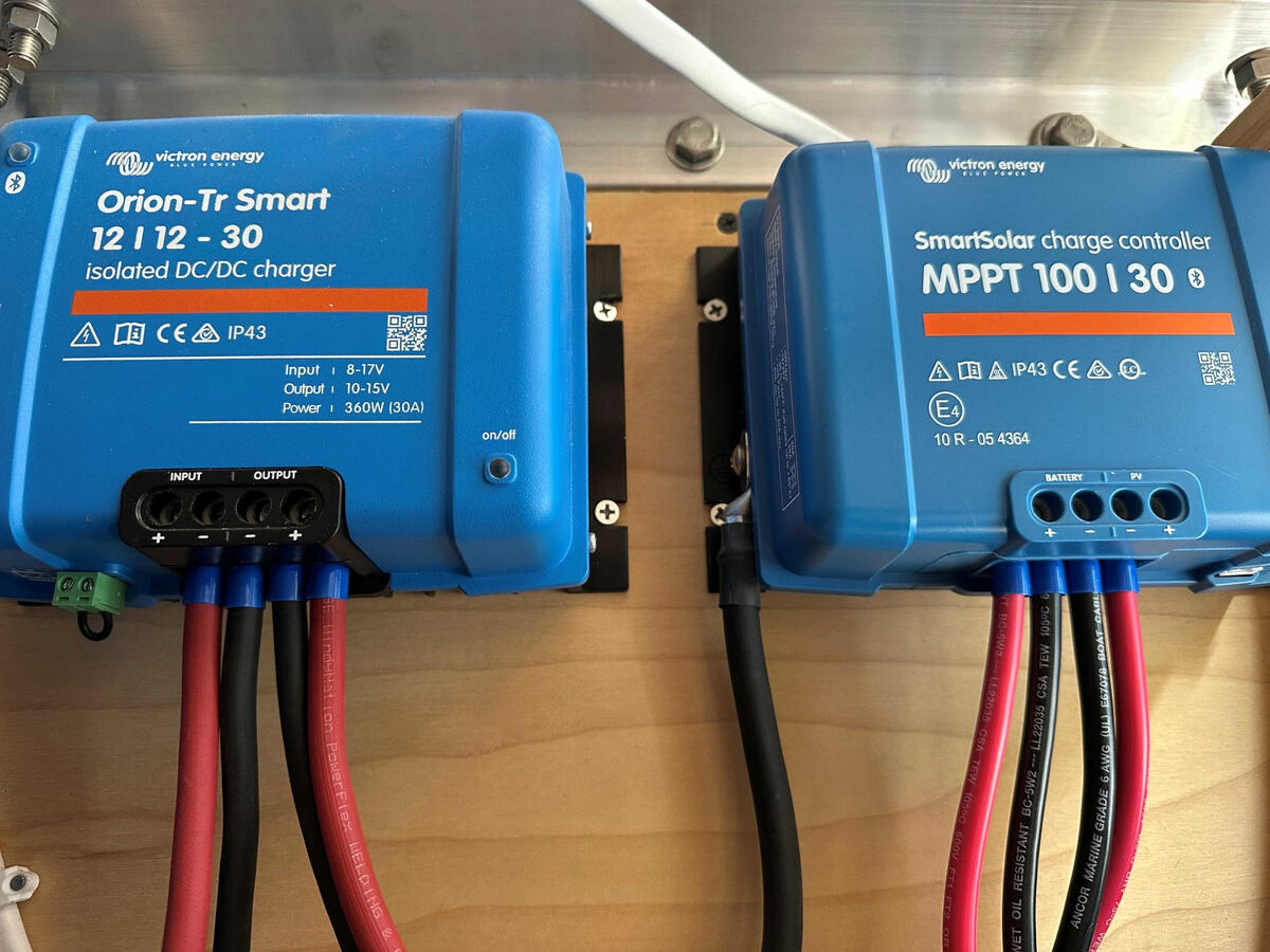 Victron DC-DC and Solar Charging System Victron Orion DC-DC charger and SmartSolar MPPT solar charge controller installed in a custom Ram ProMaster camper van electrical system.